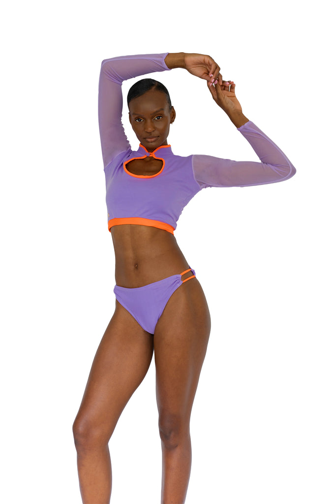 model posing lilac and orange long sleeve mesh swimsuit