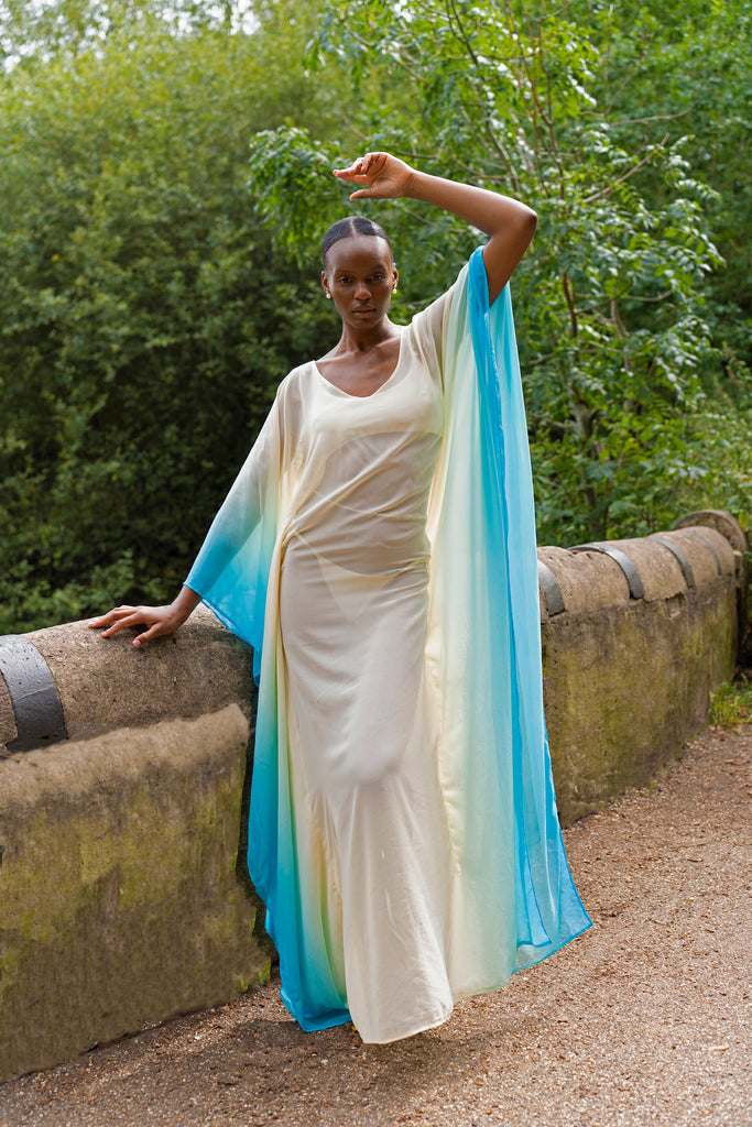 model posing in Claudia Blue/Cream Full Length Kaftan 