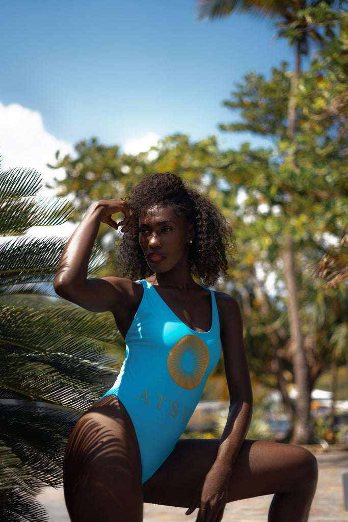 model posing in Cross Back Detail One Piece Swimsuit Atsun Logo Blue/Gold